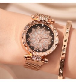 MONTRE NONAME OR ROSE CADRAN FLEUR NOIR ET OR ROSE