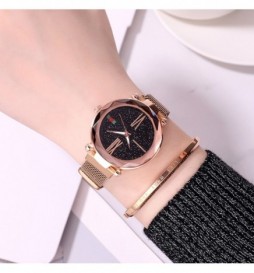 MONTRE NONAME CADRAN NOIR BRACELET OR ROSE SIGNE VERT ET ROUGE