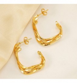 BOUCLE D OREILLE ACIER DORE CREOLE  