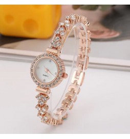 MONTRE NONAME BRACELET ET CADRAN AVEC OXYDES OR ROSE